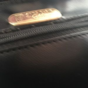 Like new Anne Klein black leather “doctors’” bag.